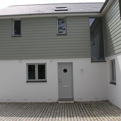 Flush sash grey casement windows and grey composite door