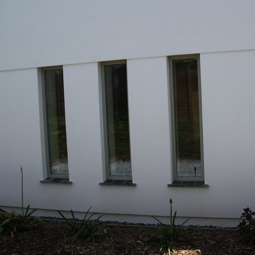 Green bespoke uPVC windows