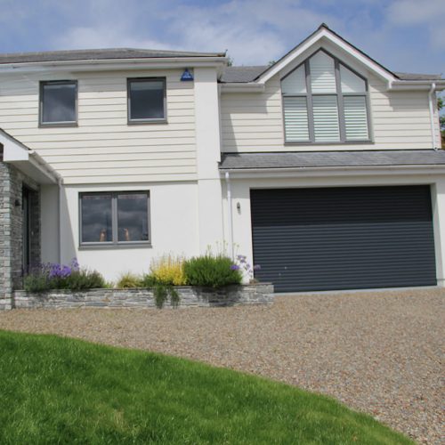 Grey uPVC casement window installation