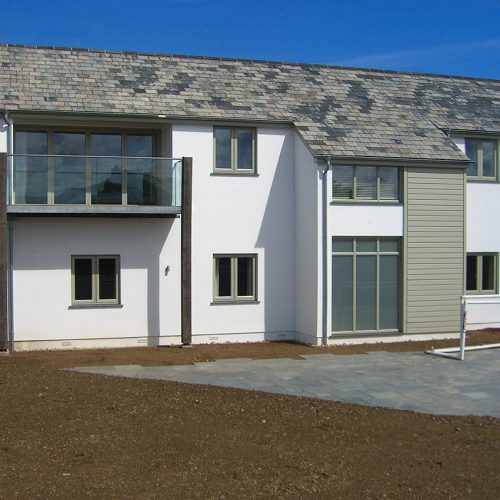 Grey aluminium windows and glass balustrades home installation