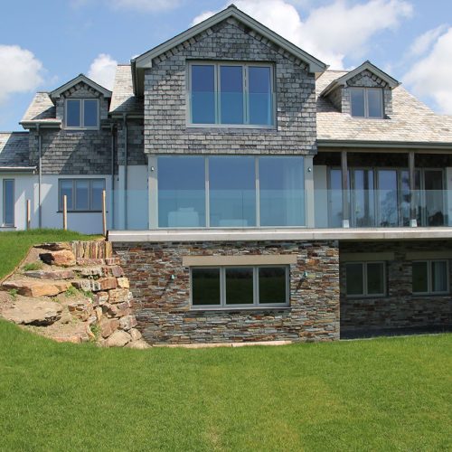 Grey Flush sash casement windows and bifold doors